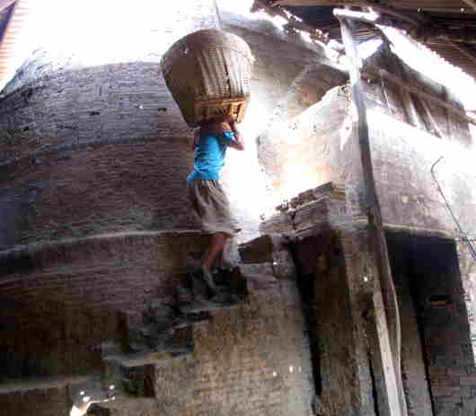 loading the hopper with rice chaff